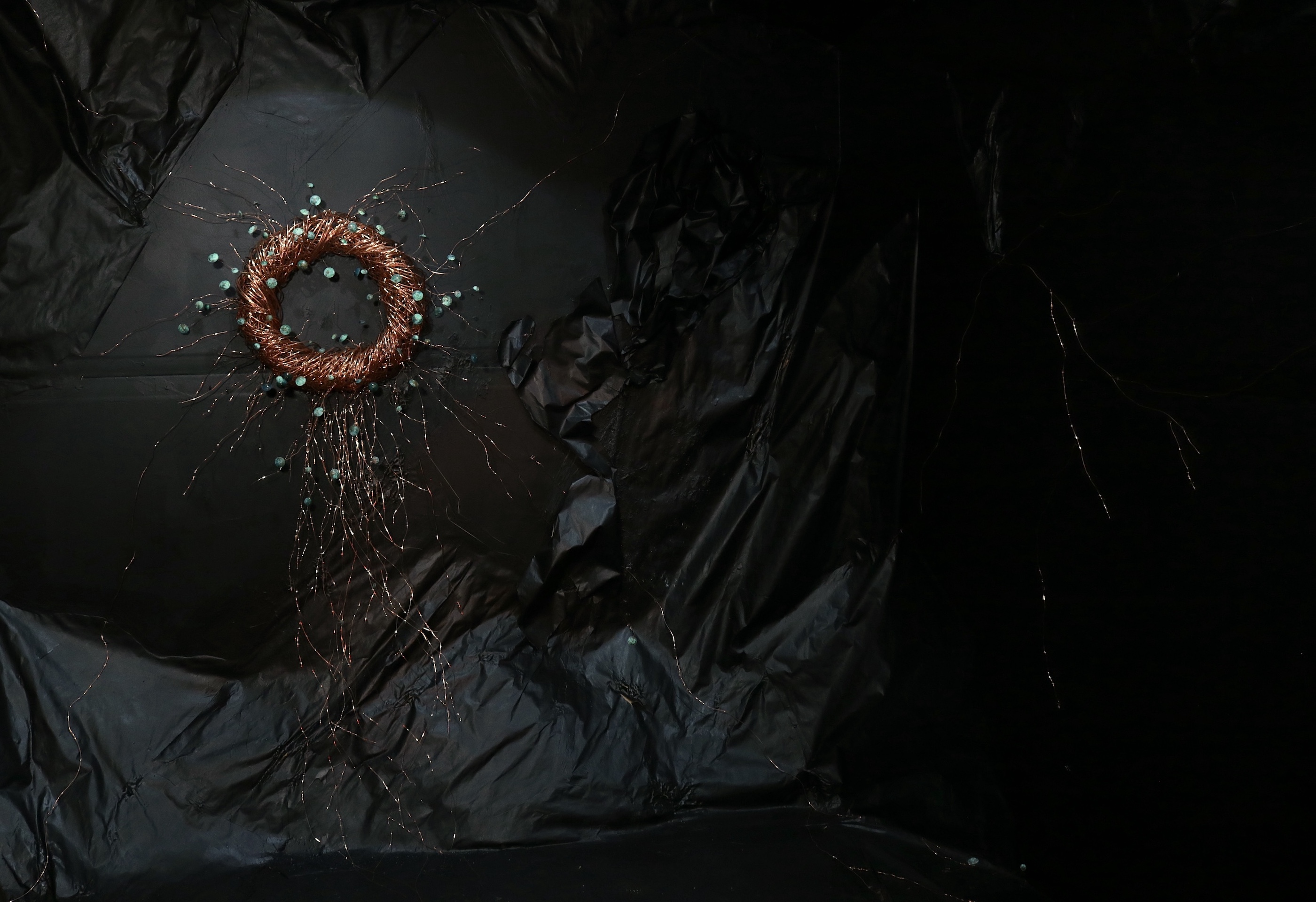 Takk for alt — copper wreath installation